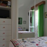 Eckbungalow mit großer Terrasse, eingezäunt und gefliest mit 1 Schlafzimmer - 1