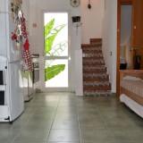 Corner bungalow with large terrace, fenced and tiled with 1 bedroom - 1