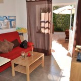 Duplex bungalow with 1 bedroom. Tiled, fenced terras with open side - 1