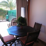 Duplex one-bedroom bungalow. Terrace tiled, fenced. With sun loungers and dining area - 1