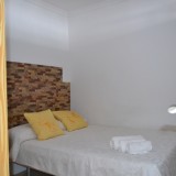 Apartamento estudio en planta baja con una pequeña sala de estar en venta en playa del ingles - 1