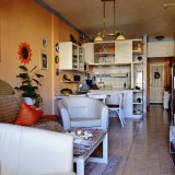 Apartment with 1 bedroom on about 63 sqm. Living area located on the 5th floor, overlooking the pool - 1