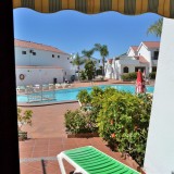 Bungalow de un dormitorio, terraza abierta de azulejos con vistas a la piscina comunitaria - 1